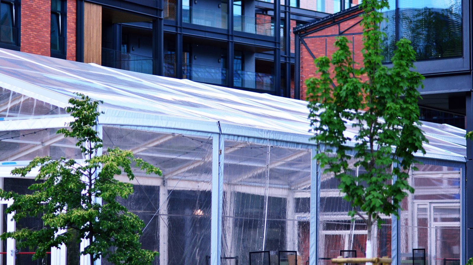 building with blue roof that has white awning