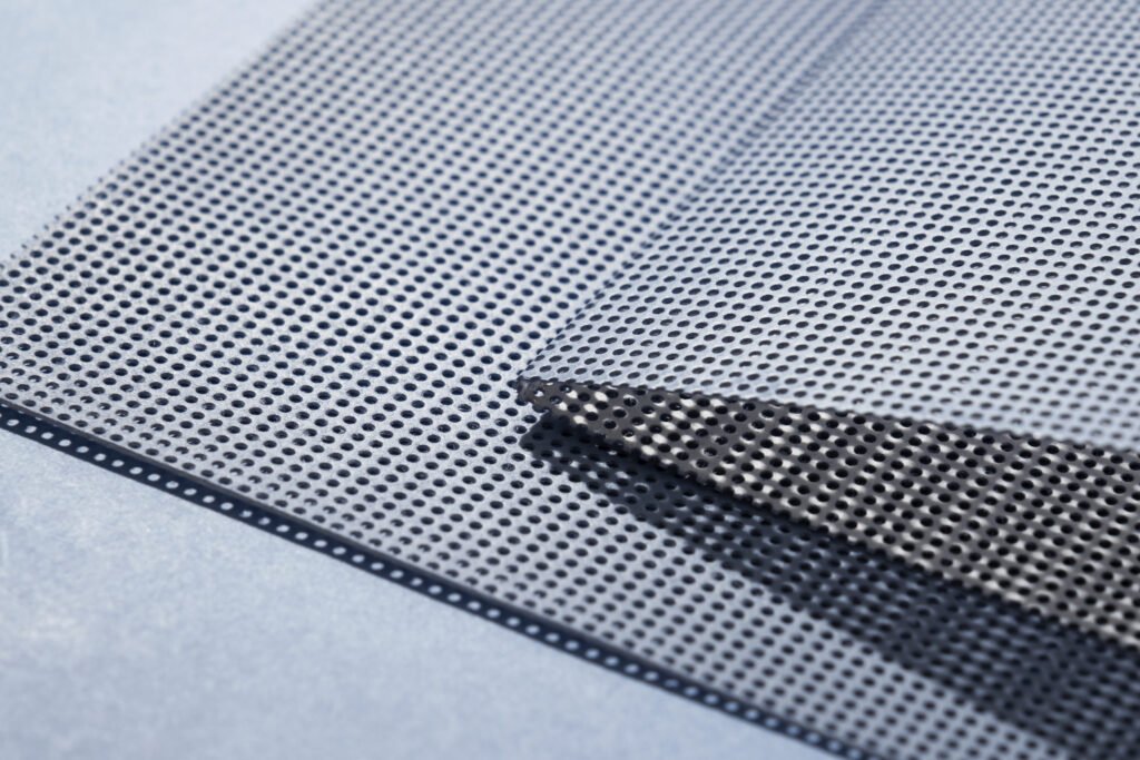 microperforated sheet background still life